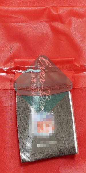 NFTB EVA red oversized rain poncho branded label